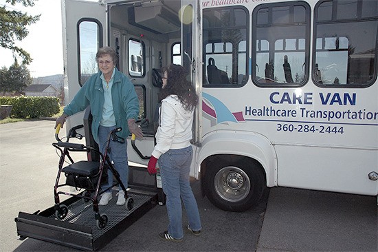 Ona Smith being helped off the Care Van by driver Nancy Nibarger