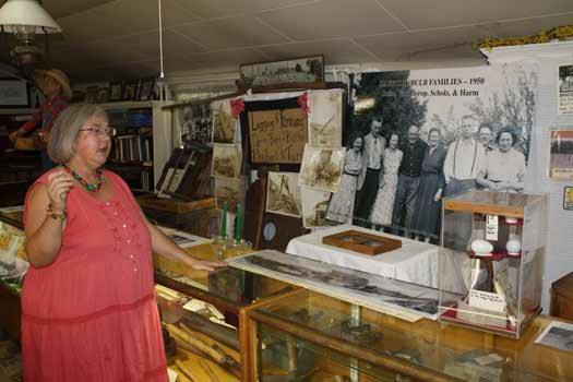 Vicki Connor explains the significance of the older tools in the Ryan House's display room. The Sumner Historical Society is in the midst of an archival overhaul.