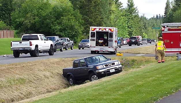 Two car collision blocks traffic on state Route 410 near Buckley.