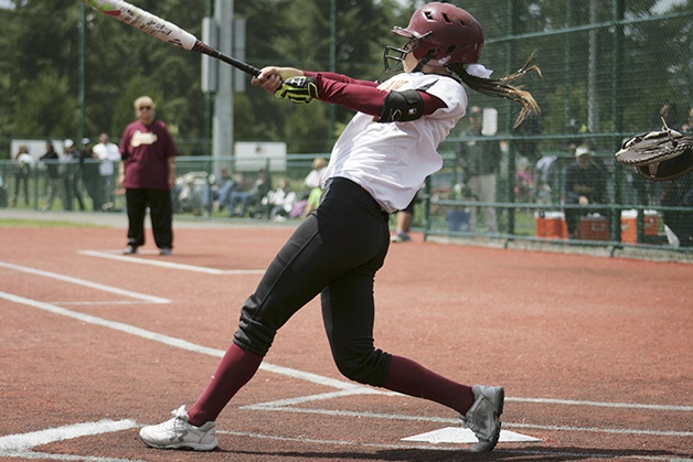 Enumclaw's Quinn Breidenbach watches her game one walk off home run leave the field Friday at the Regional Athletic Complex in Lacey. The Hornets won 2-1. Photo by Sarah Brenden