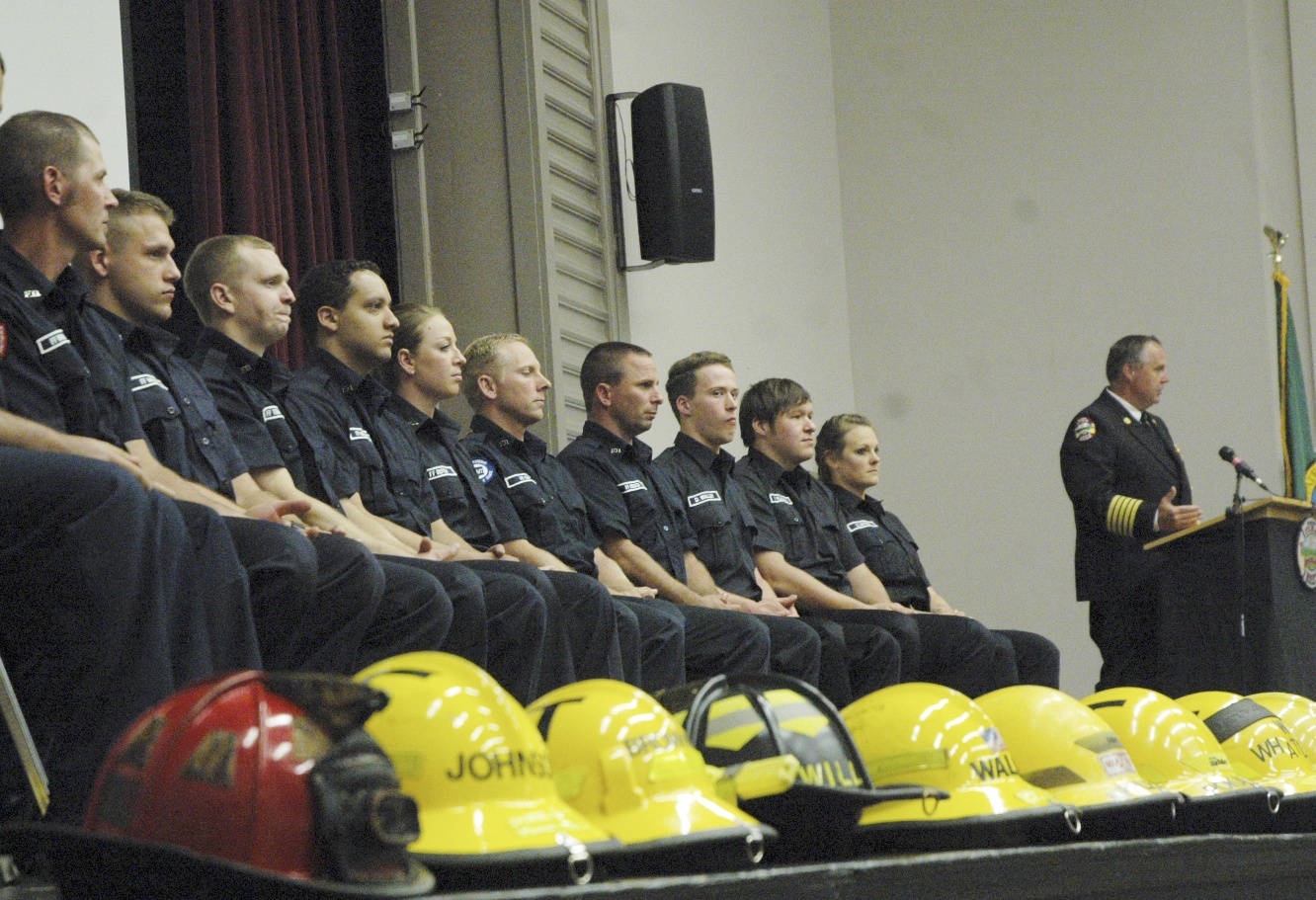 Fire chief Alan Predmore shares some last-minute advice with the 29 members who graduated last week from the Buckley fire department’s most recent fire academy. Photo by Kevin Hanson.