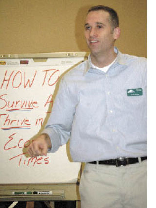 Jeff Perlot delivers his business message to a recent meeting of the Enumclaw Chamber of Commerce.