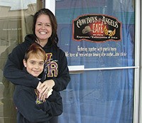 Owner Melissa Polland and son Gunnar welcome guests to Cowboys and Angels Café.
