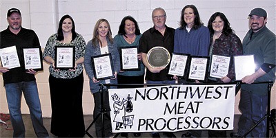 The Olson’s Meats crew displays the hardware earned during competition against processors from throughout the Pacific Northwest.