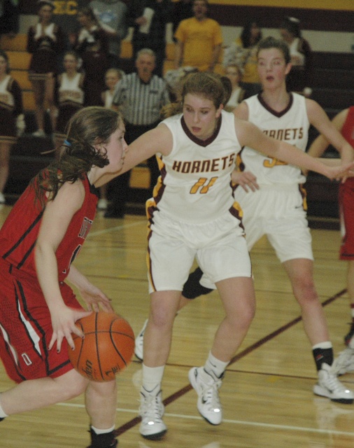 Hornet seniors Maci Goethals (11) and Darian Gore are a part of a veteran group that takes the floor for White River girls.
