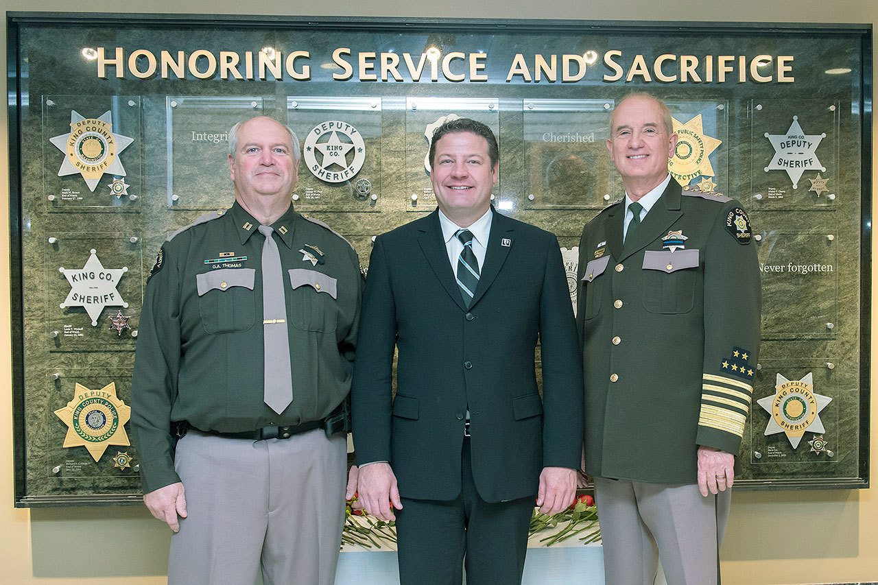 King County Sheriff’s Office Capt. Greg Thomas, Council Vice Chair Reagan Dunn and Sheriff John Urquhart at the unveiling of the memorial for deputies killed in the line of duty.                                Capt. Greg Thoman, Councilman Reagan Dunn and Sheriff John Urquhart. Courtesy photo.