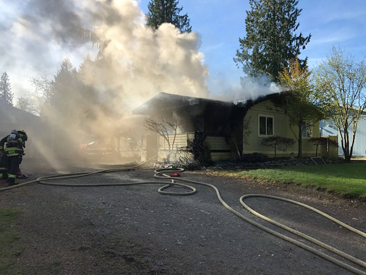 East Pierce Fire and Rescue firefighters saved one dog and two salamanders from a Bonney lake fire on Friday. Submitted image.
