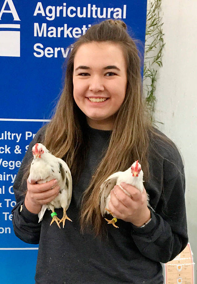 Ashley Buchholz, from the White River FFA chapter, was a champion with her chickens. Submitted photo.