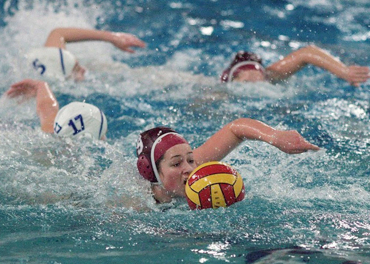 EHS senior captain Emilie Weyer mounts a counterattack during a game earlier this season. Photo courtesy Doug and Mel Hall.