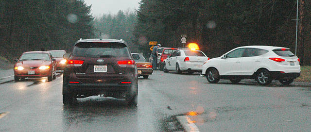 Traffic on Enumclaw’s side of the White River bridge on a rainy day. Photo by Kevin Hanson.