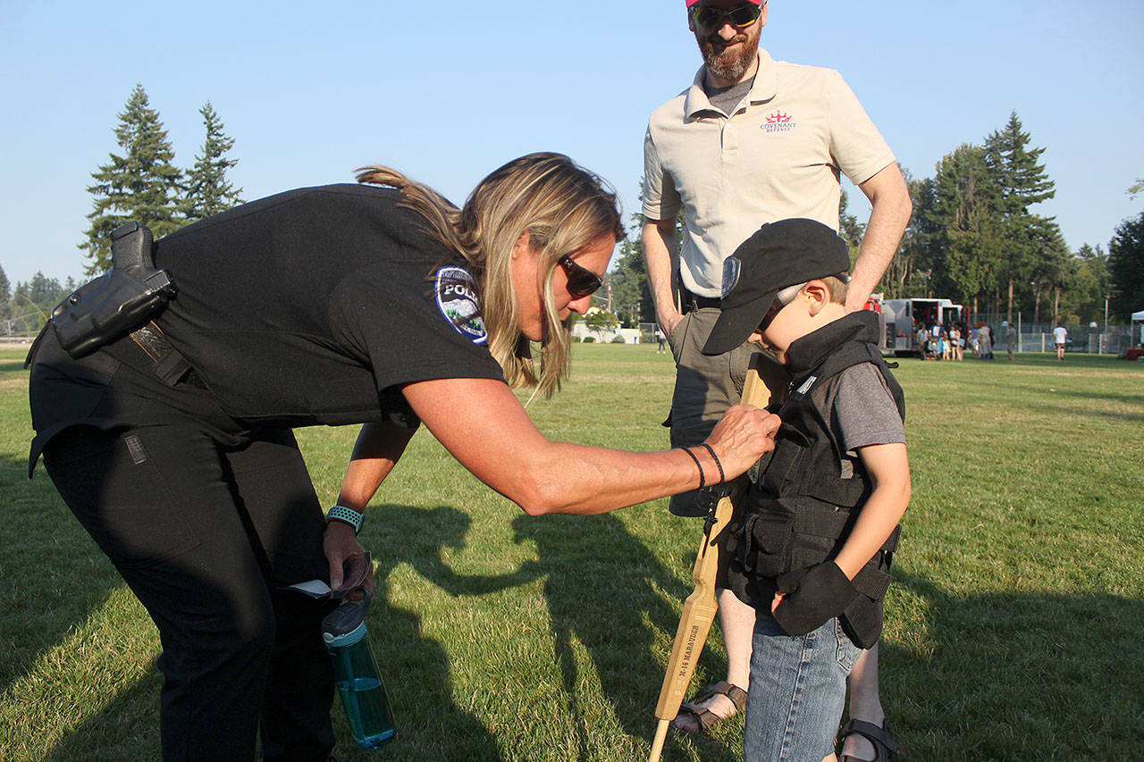 Bonney Lake Police Chief Dana Powers was greeting kids and families at last week’s National Night Out event, making sure everyone who attended had a good time out with her department. Photo by Ray Still