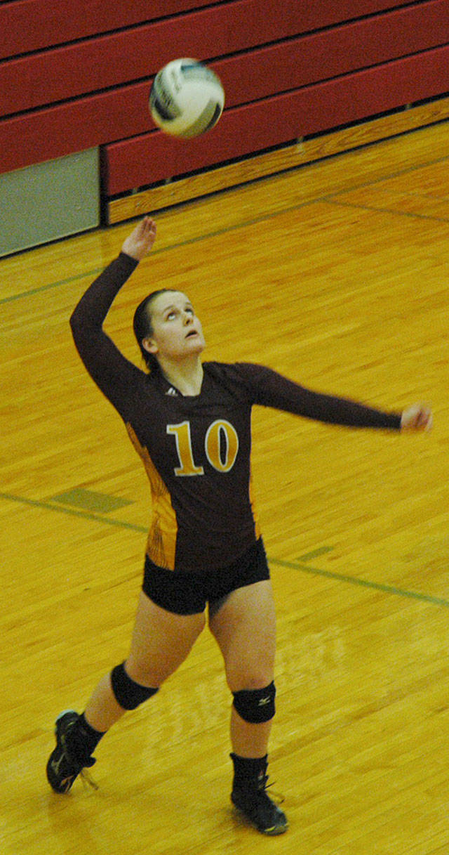Hope Baldyga launches a serve against the Selah Vikings during last year’s Class 2A state tournament. File photo by Kevin Hanson