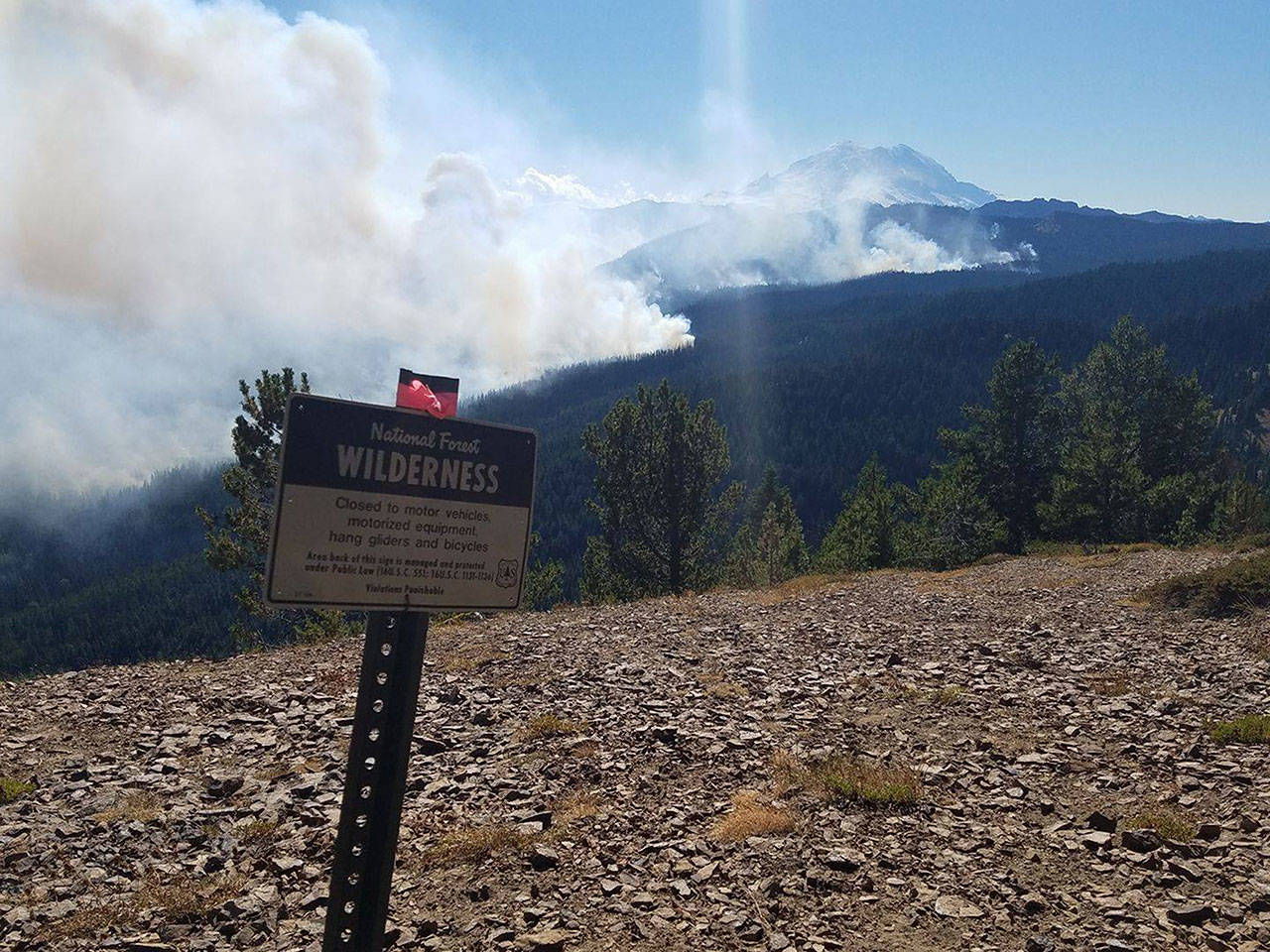 The Norse Peak Fire as seen from the Cougar Valley trail head. Courtesy photo