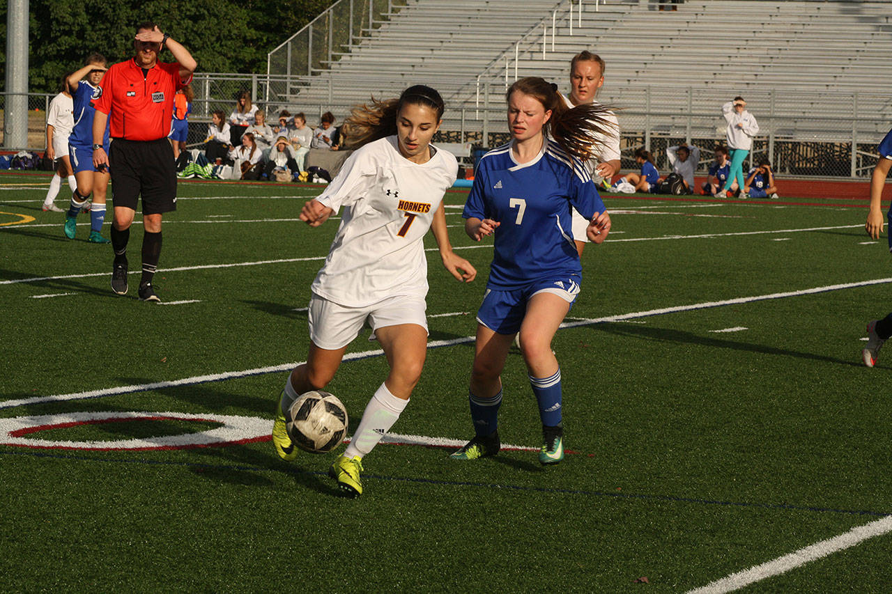 White River&rsquo;s junior varsity squad hosted Fife Thursday night, Sept. 21. Above, the Hornets&rsquo; Allison Koch moves past a defender. Photo by Kevin Hanson