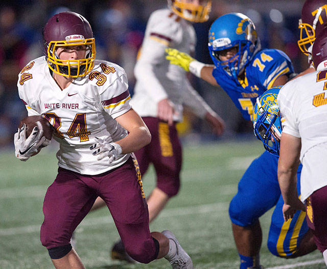White River&rsquo;s Luke Northan looks for some running room through Fife&rsquo;s defenses. Photo by Vince Miller