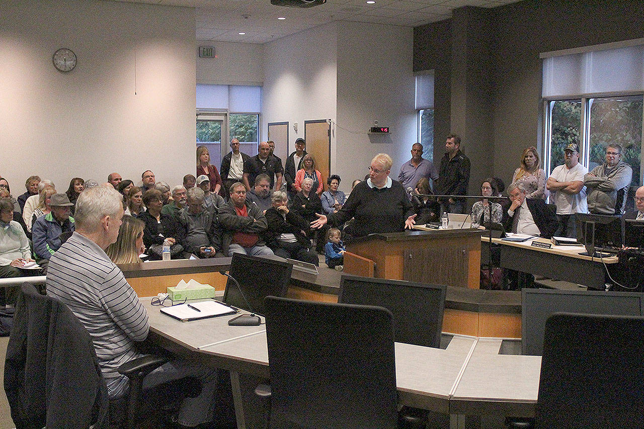 Cindy Gilsing was one of dozens of Bonney Lake residents who received a noticeably higher water bill and attended the Oct. 10 council meeting to complain to the city. Those who spoke at the meeting said their bills doubled, or ever tripled in price without increasing water consumption. Photo by Ray Still