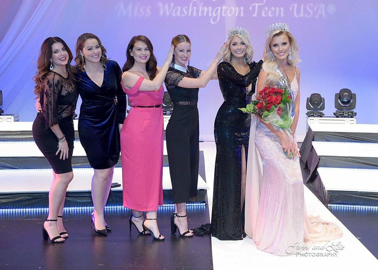 The passing of the crown with 2008 title holder Michelle Font, 2011 Angelina Kayyalaynen, 2013 Casandra Searles, 2015 Mckenzie Novell, 2017 Alex Carlson-Helo and finally, Enumclaw’s Abigail Hill. Photo courtesy Jerry and Lois Photography.