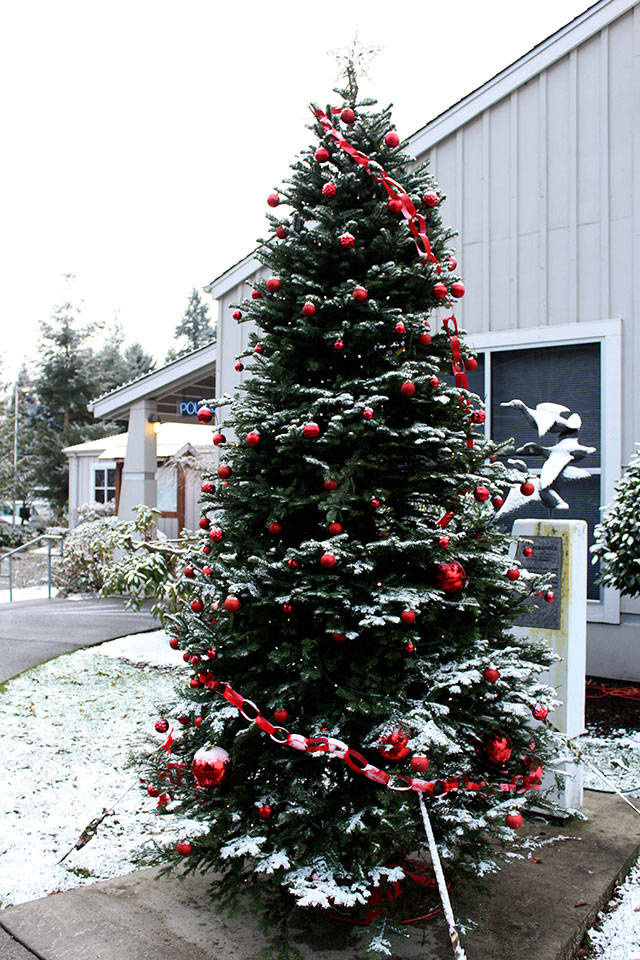 The Bonney Lake holiday tree was able to see a few days of snow last year after the annual lighting ceremony. This year’s ceremony will be held at 6 p.m. Dec. 2. Photo by Ray Still
