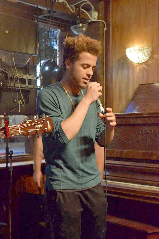 Erik Van Hulse performed at several open mic nights in Seattle before competing in the Coast 2 Coast Live competition that netted him a ticket to the national competition in Florida next year. Submitted photo