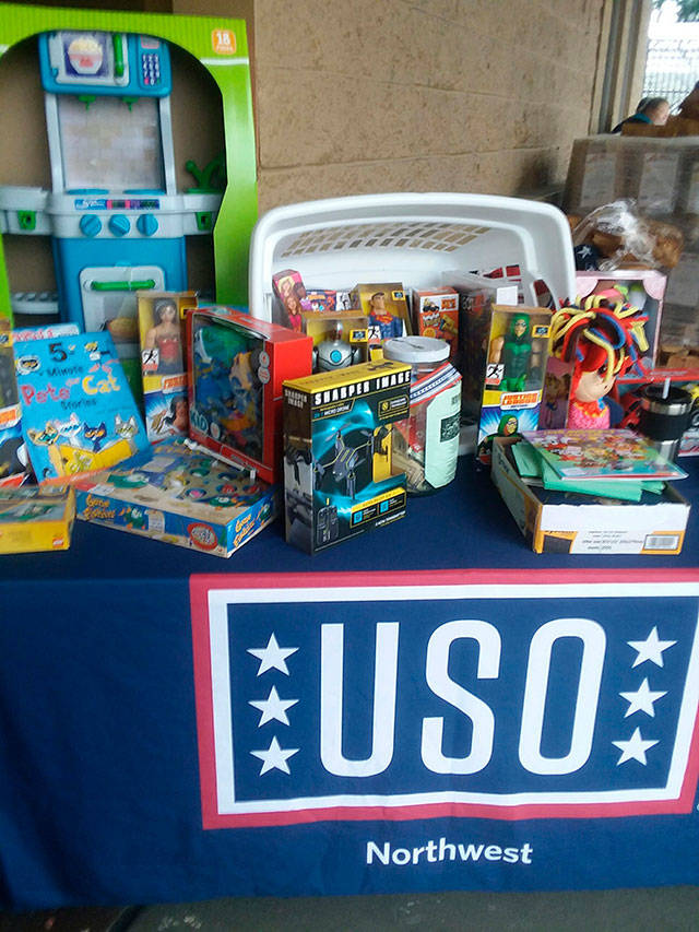 The United Service Organizations held a toy drive at Bonney Lake’s Walmart earlier this month, receiving more than $3,000 in cash and toy donations for kids who have a deployed parent over the holidays. Submitted photo