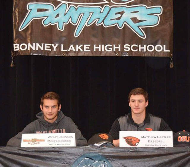 Wyatt Johnson, left, and Matthew Gretler have sign with collegiate programs. Submitted photo