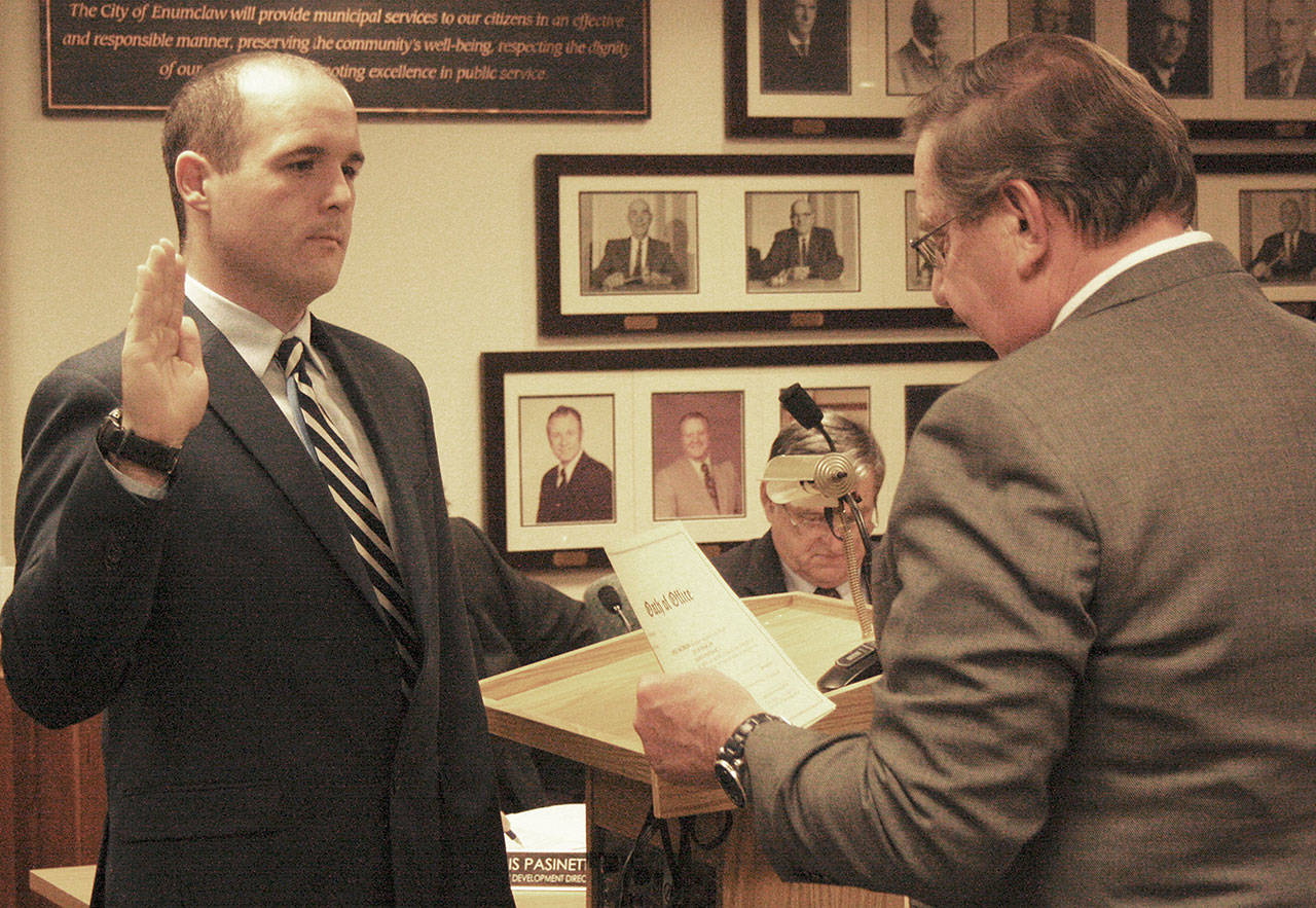 Multiple new council members were sworn onto the Enumclaw City Council during the Jan. 8 meeting, including Kyle Jacobson (pictured), Anthony Wright and Hoke Overland. Additionally, Jan Molinaro was officially sworn in as the citys new mayor. Photo by Kevin Hanson
