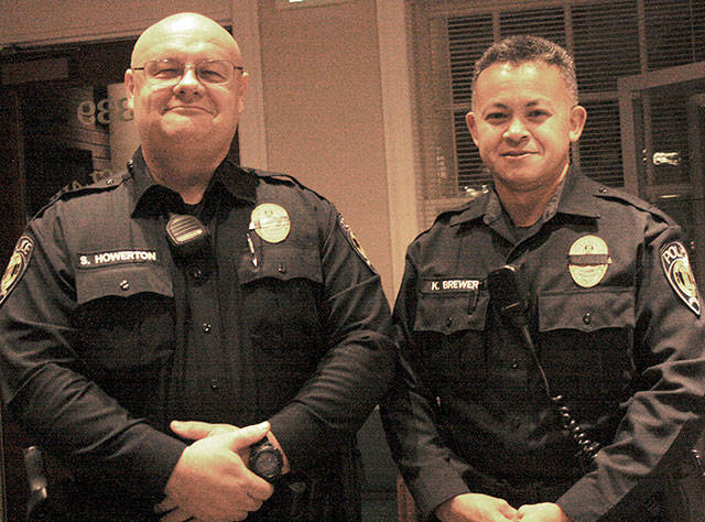 Steve Howerton, left, and Kim-Xuan Brewer have been hired to round out the Enumclaw Policie Department.