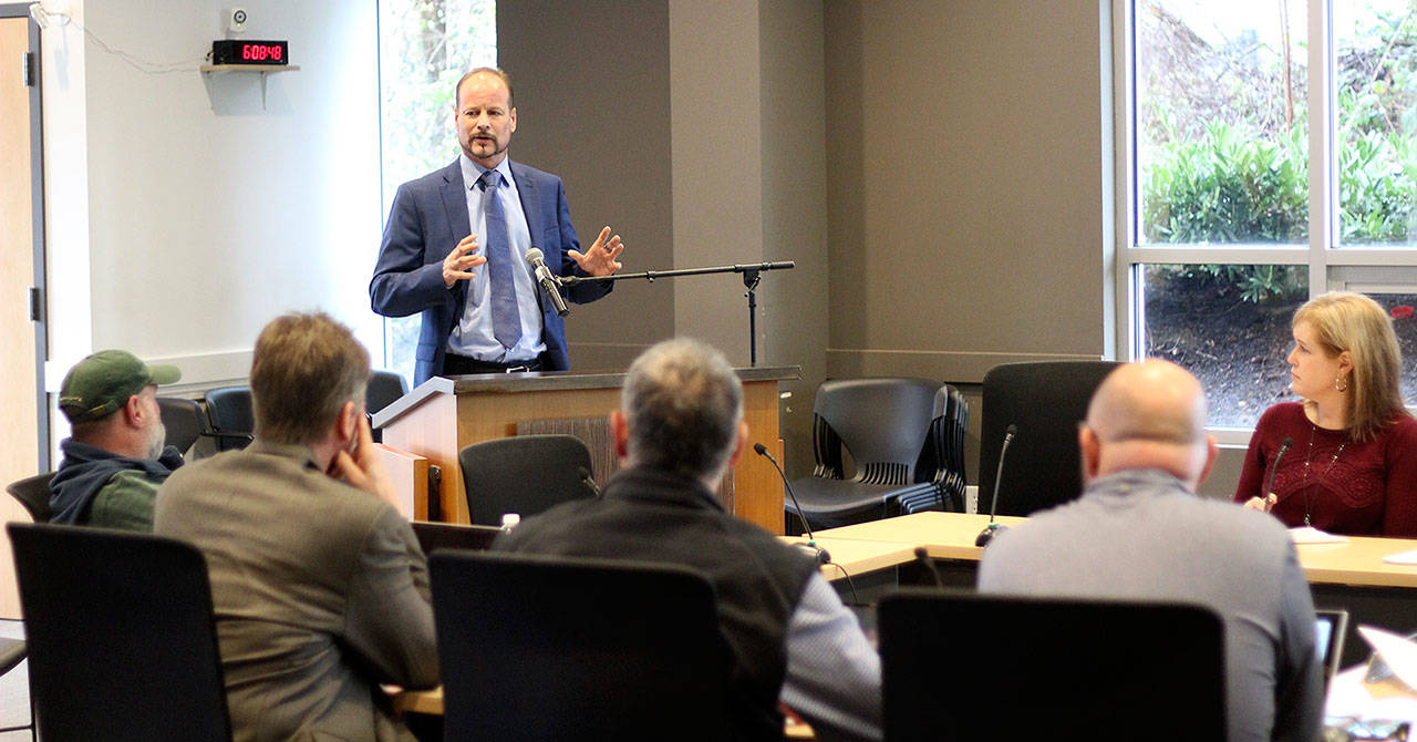 Geoff Dillard of RH2  an engineering firm  brought to the Bonney Lake City Council a third draft of Capital Improvement Projects the city needs to tackle in the next five years, and warned them of the consequences if they do not. Photo by Ray Still