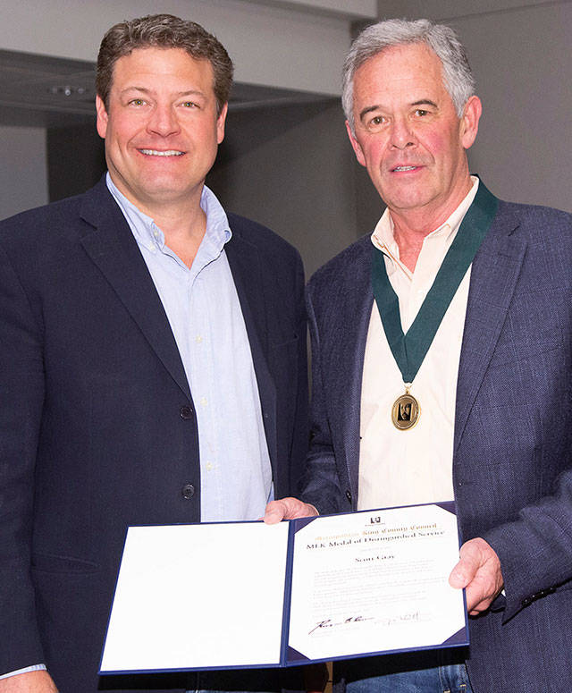 Scott Gray (right) was presented with the Martin Luther King Jr. Medal of Distinguished Service by County Councilman Reagan Dunn. KING COUNTY PHOTO