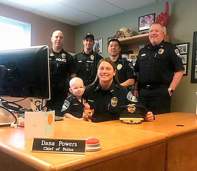 Police Chief Dana Powers with Chief For A Day Rory, who was diagnosed with acute myeloid leukemia in December 2017. Image courtesy Bonney Lake Police Department