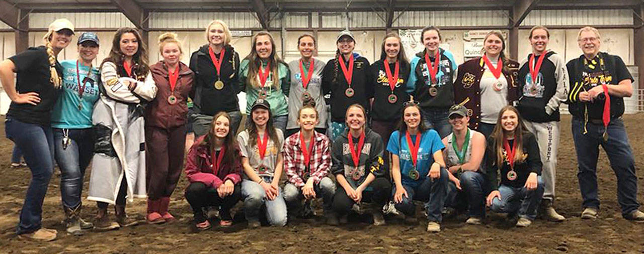 The Enumclaw High equestrian team, with a few coaches and minus a couple of riders, gathered for a group photo following awards at the state meet in Moses Lake. SUBMITTED PHOTO