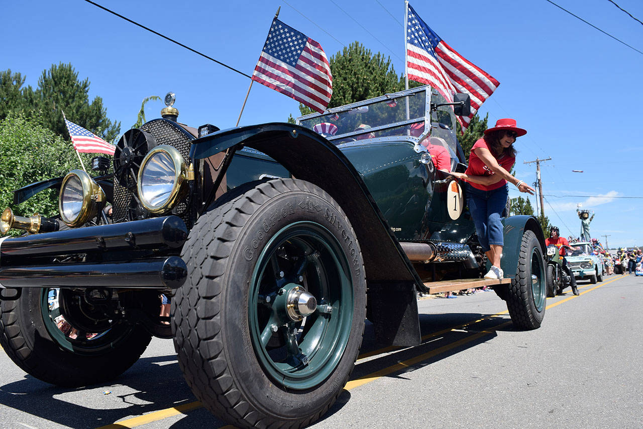 Antique fire trucks are just part of the old-fashioned charm of the Maxwelton Fourth of July Parade. It’s seeking donations to stay afloat. File photo