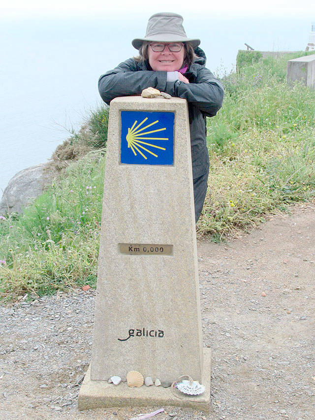Becky Rush-Peet at the very start of her pilgrimage. The scallop shells at the bottom of the marker is a symbol of the Camino de Santiago. According to some stories, the ship carrying St. James’ body was lost at sea, but when it was found, it was covered in scallops. In other stories, a groom being married while on a horse saw the boat carrying St. James. The horse spooked and dove off into the sea with the rider, and when they returned to shore, they were covered in shells. Either way, the shell is now a symbol of the pilgrimage. Photo courtesy James Peet.