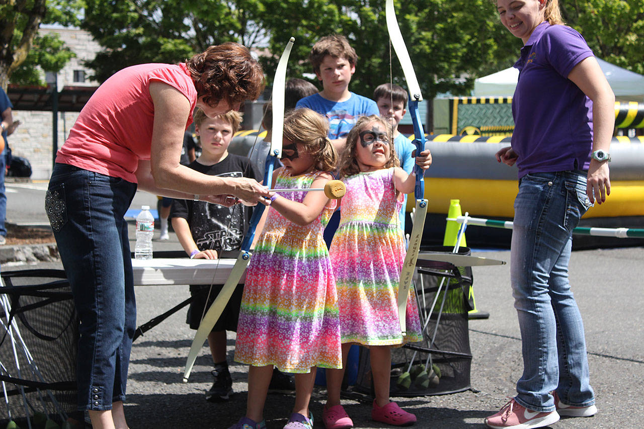 There will be loads of activities for kids at the Enumclaw Street Fair. Last year, there was an archery range with hovering targets. Photo by Ray Still