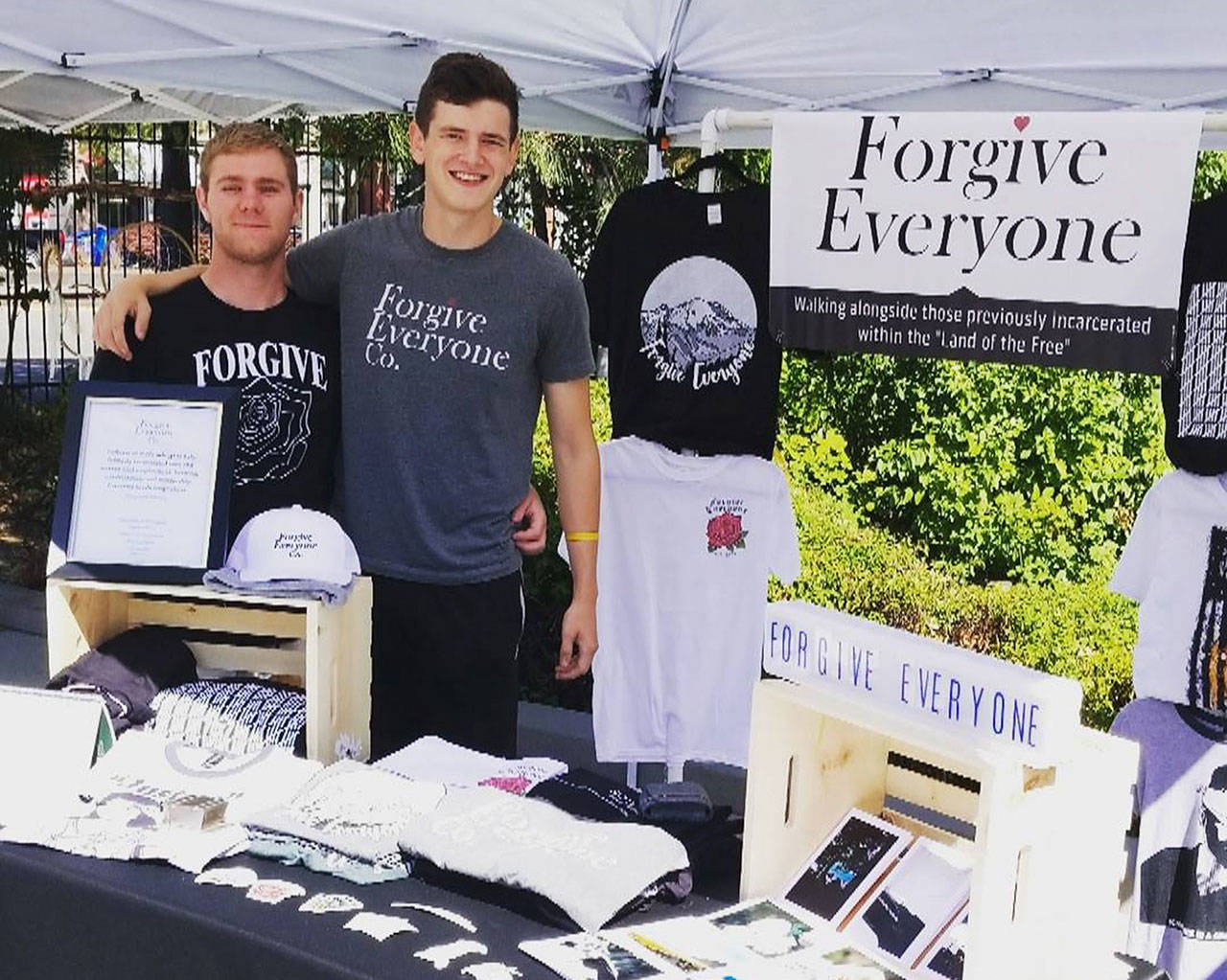 Sky Rich, right, with his friend Brian Kimberling, who was helping sell Forgive Everyone Co. gear at the recent Happy Market on Pacific Avenue in Tacoma. Photo courtesy Sky Rich
