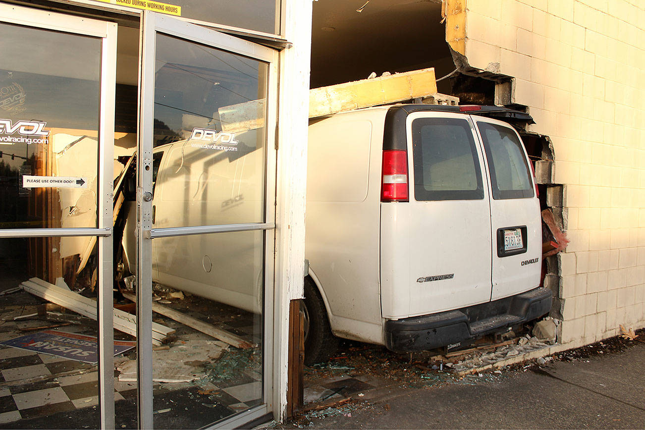 Van crashes into Enumclaw business