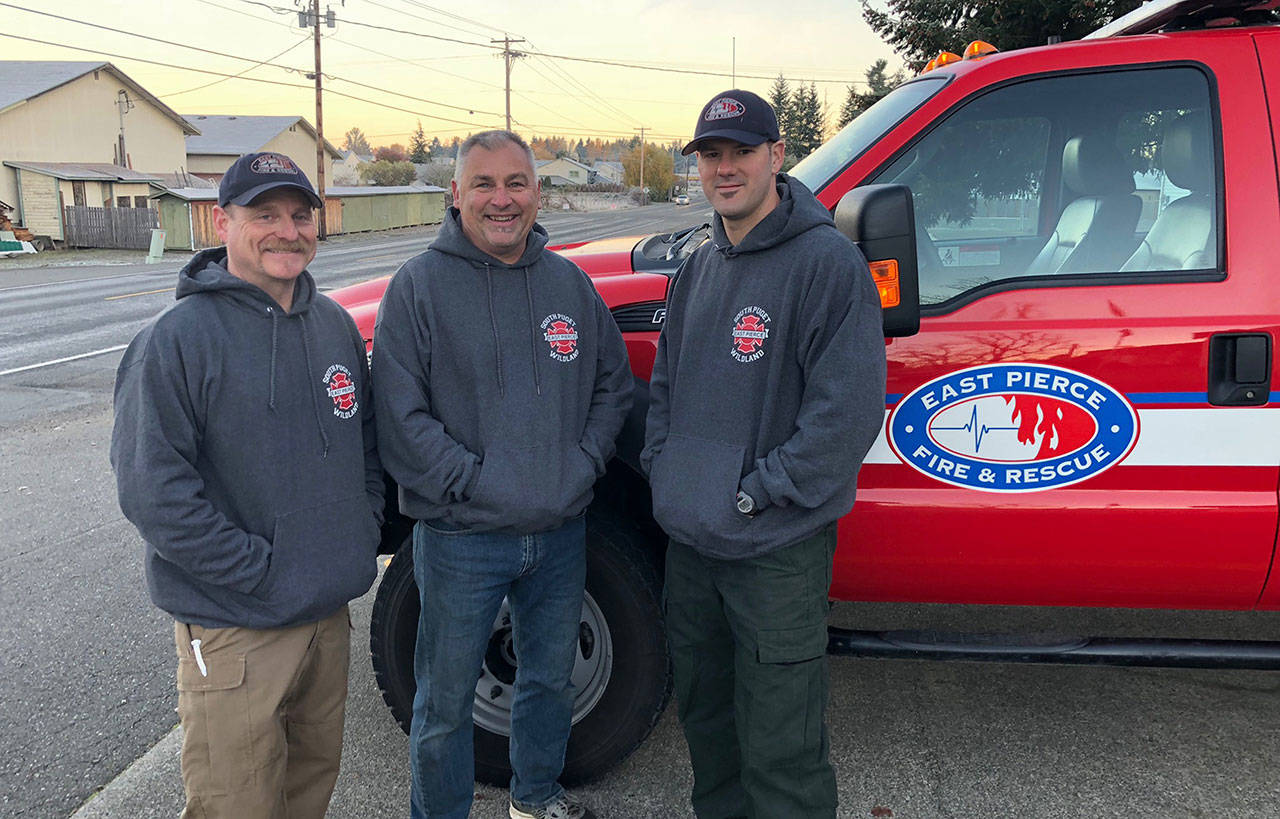 Vance Mettlen, Doug Babcock and Rex Orcutt were deployed to the Woolsey Fire in southern California Sunday, Nov. 11. Photo courtesy East Pierce Fire and Rescue