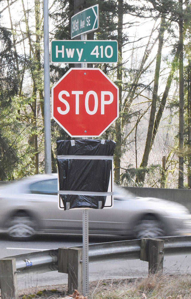 The signs on 241st and SR 410 are already up, but are covered. There have been reports of the signs being removed, but the new “no right turn” policy will go into effect Feb. 4. Photo by Kevin Hanson