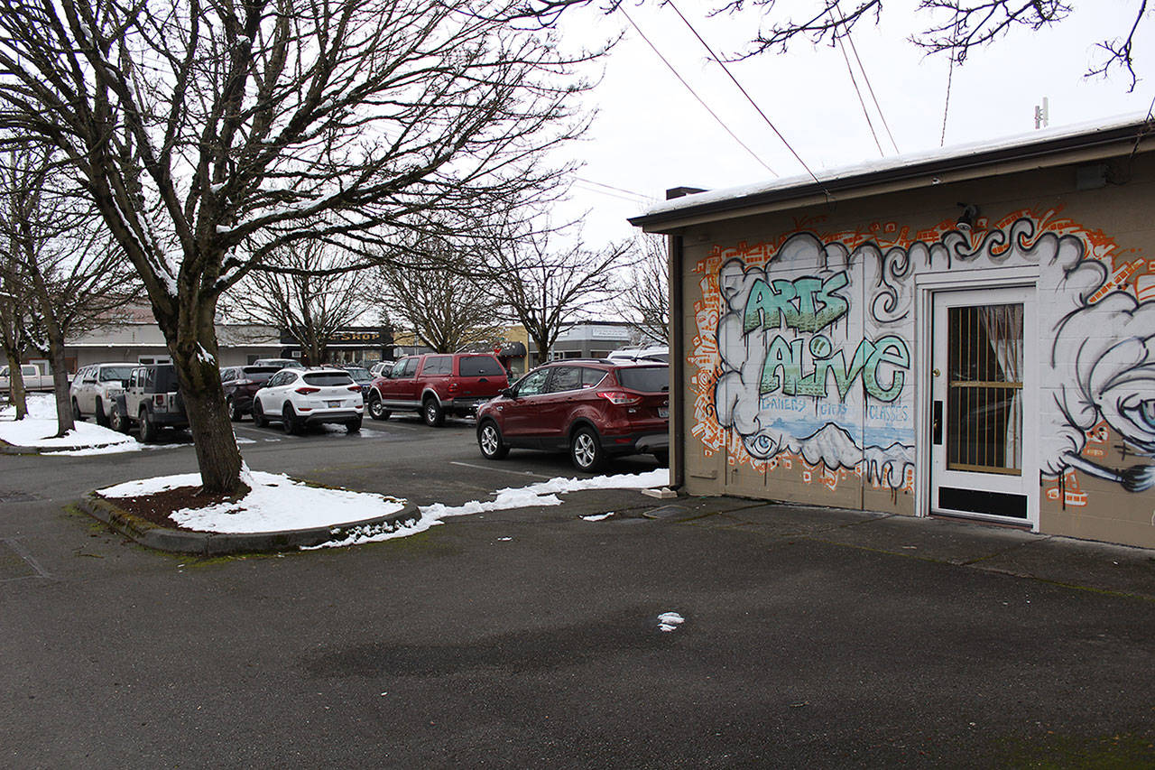 This parking lot could be turned into a four story building with underground parking, retail stores, and condos, if the Enumclaw City Council believes it’s the right fit for their city. Photo by Ray Miller-Still