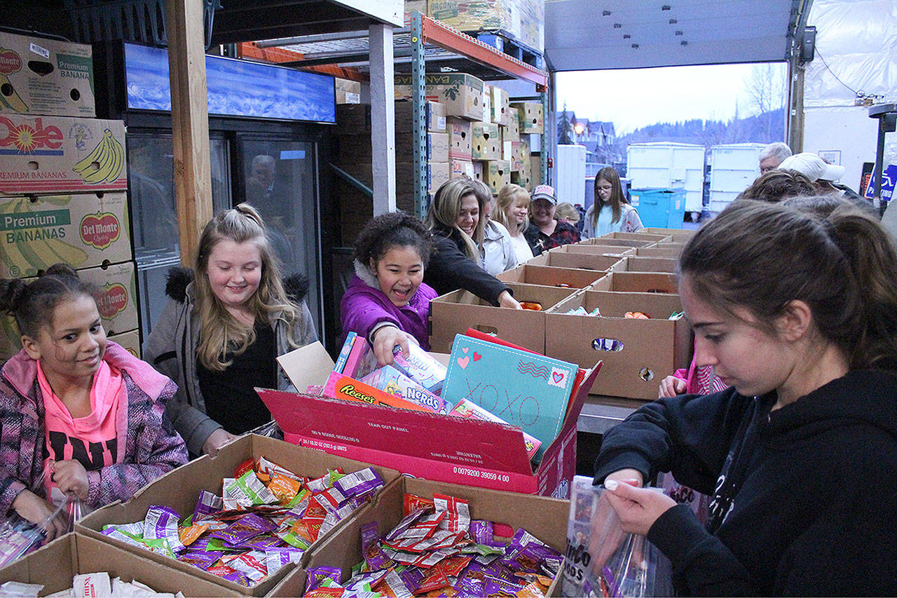 Kinzi Hansen, second from the left, is joined by her school friends Kiyah Price to her right, and Stella Augoustiop on her left. Photo by Ray Miller-Still