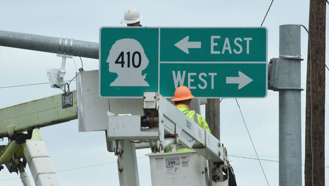 Part of Buckley’s traffic light upgrade project includes installing new highway signs. Photo by Kevin Hanson
