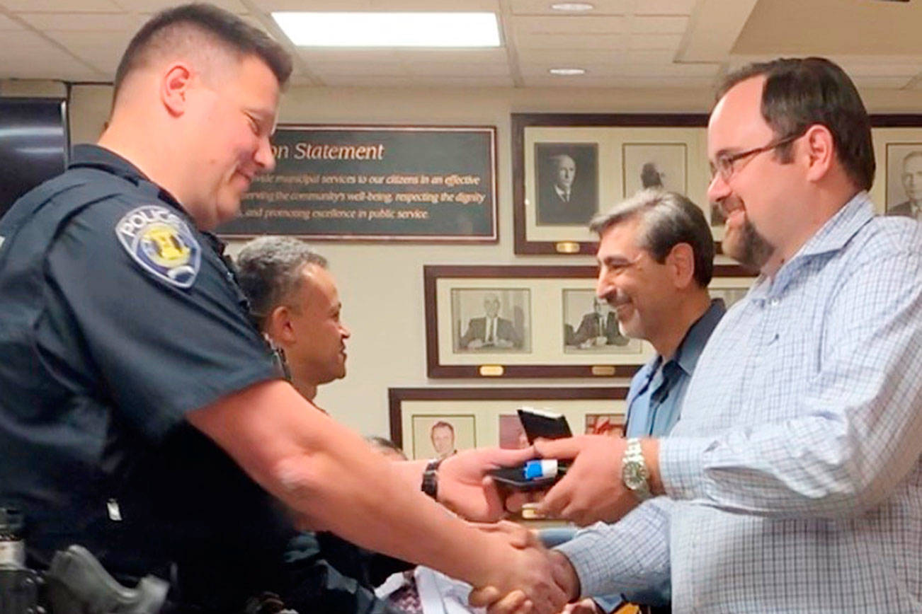 Enumclaw officers honored for life-saving efforts in car wreck