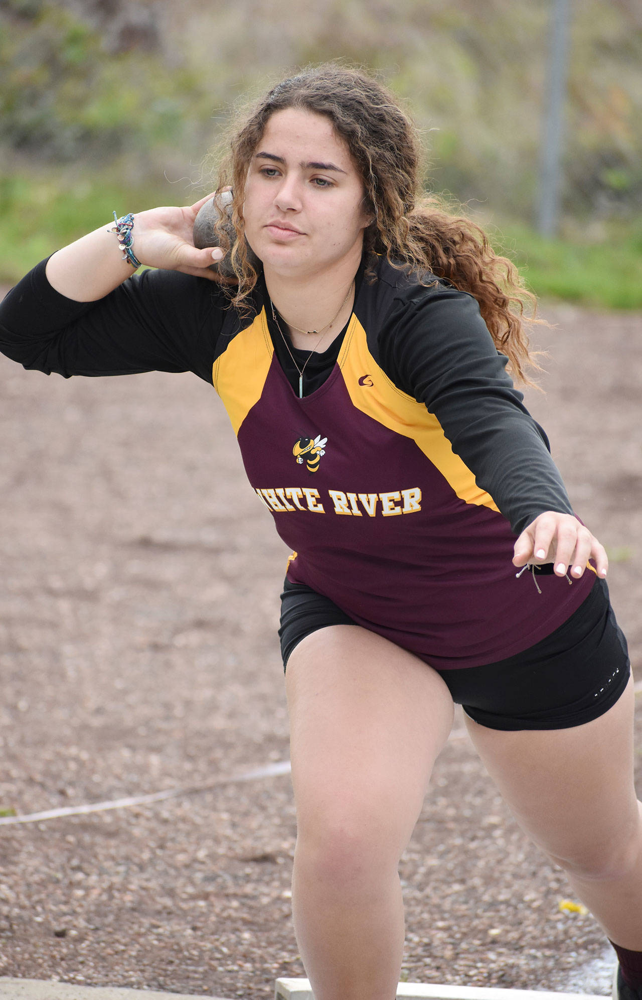 White River’s Paidon Froemke prepares here to launch a second-place effort in the shot put; she won both the discus and javelin on Thursday. Photo by Kevin Hanson