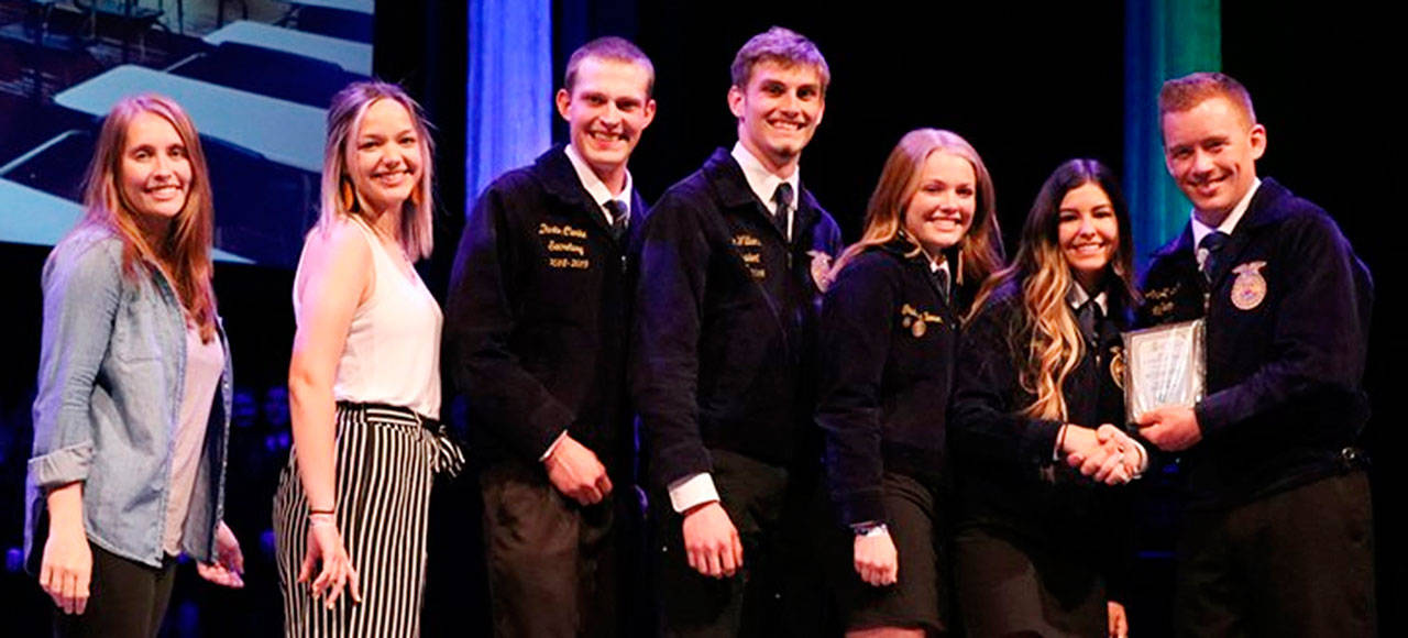 Scenes from Pullman: receiving first-place honors for FARM for Kids were, from left, chapter advisers Kaitlin Norton and Kendra Bertrand and chapter members Dustin Clarke, Lane Williams, Gracelyn Boren, Daisy Ruvalcaba; presenting the award was state officer Zach Schilter (far right). Contributed photos