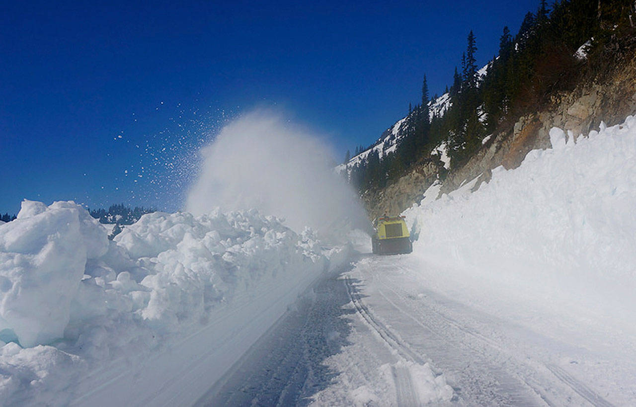 Crews remove heavy snow from state Route 410, getting Chinook Pass open for eastbound travelers. Photo courtesy WSDOT