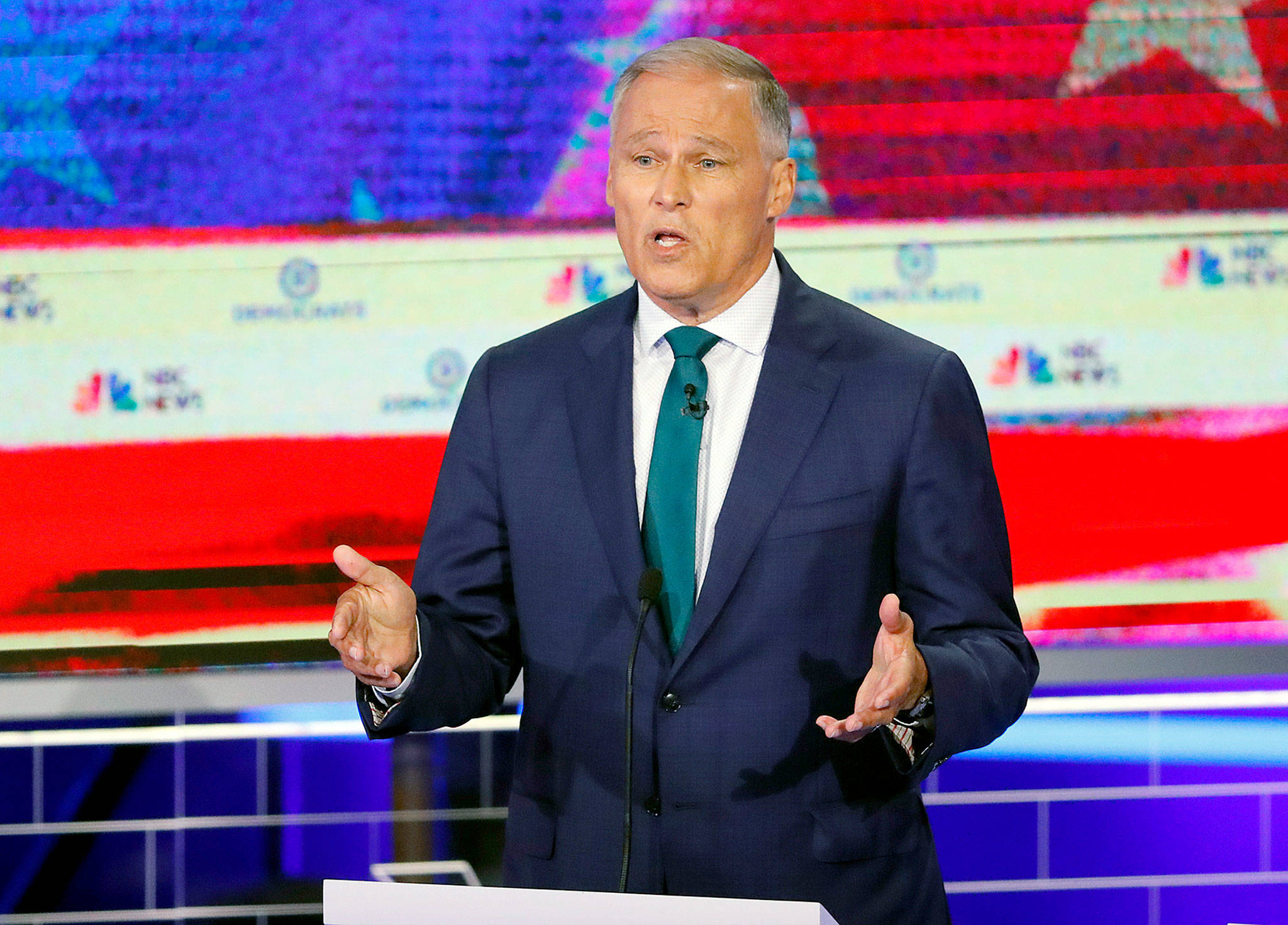 Democratic presidential candidate and Washington Gov. Jay Inslee speaks during a primary debate hosted by NBC News in Miami on Wednesday. (AP Photo/Wilfredo Lee)