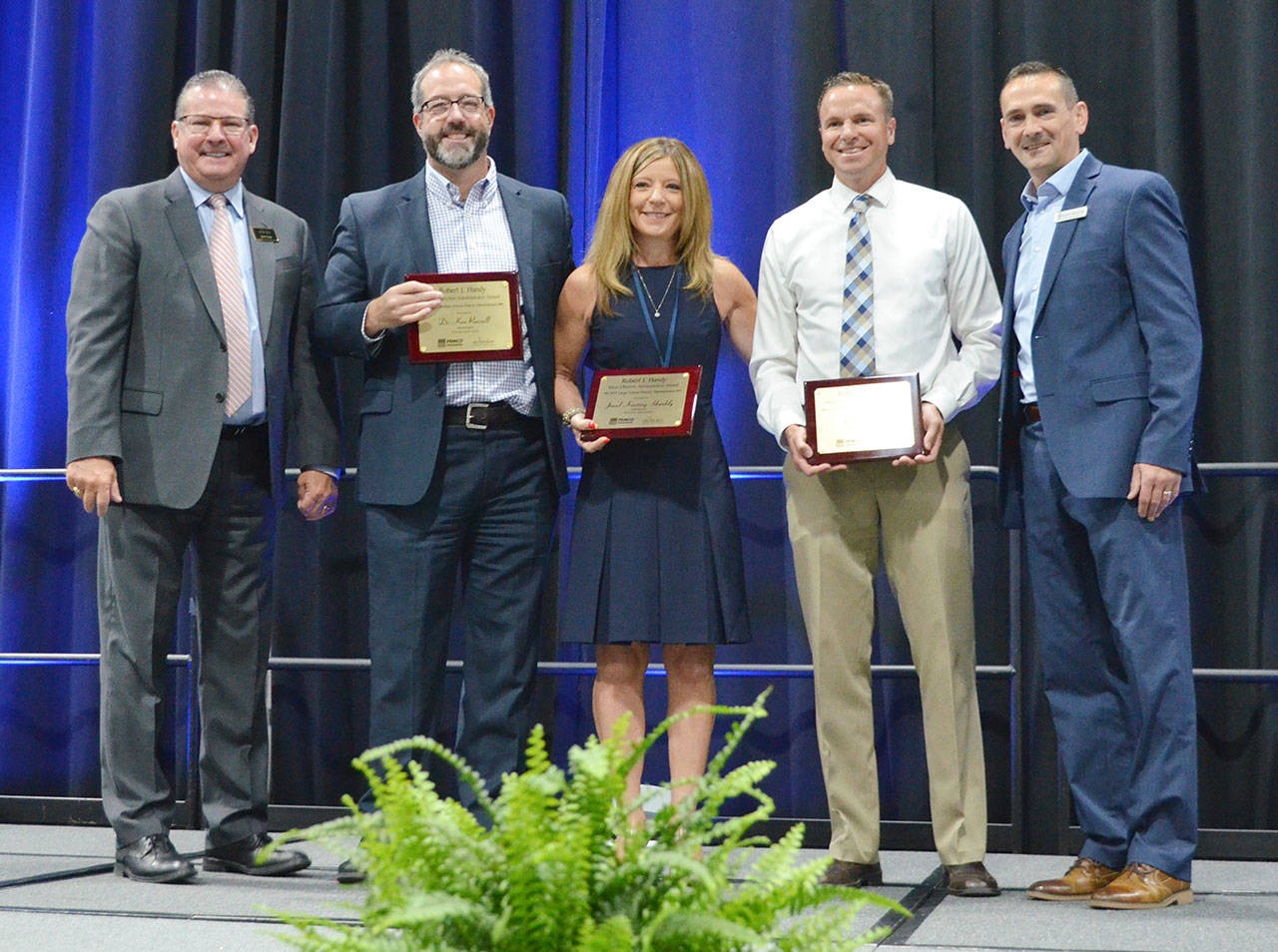 White River Superintendent Janel Keating Hambly takes the stage during the annual Washington Association of School Administrators meeting. Pictured are, from left: Joel Aune, WASA Executive Director; Dr. Ken Russell, superintendent, Riverside School District; Keating Hambly; Chad Prewitt, principal, Davenport School District; and Dr. Scott Seaman, executive director, Association of Washington School Principals. Submitted photo