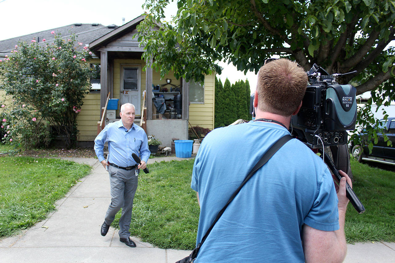 After hearing of the FBI search warrant raid, King5 reporter Chris Ingalls — who originally broke the story about the investigations into Allan Thomas’ alleged public corruption — came to Enumclaw to interview Thomas. Thomas didn’t appear to be home when Ingalls visited. Photo by Ray Miller-Still