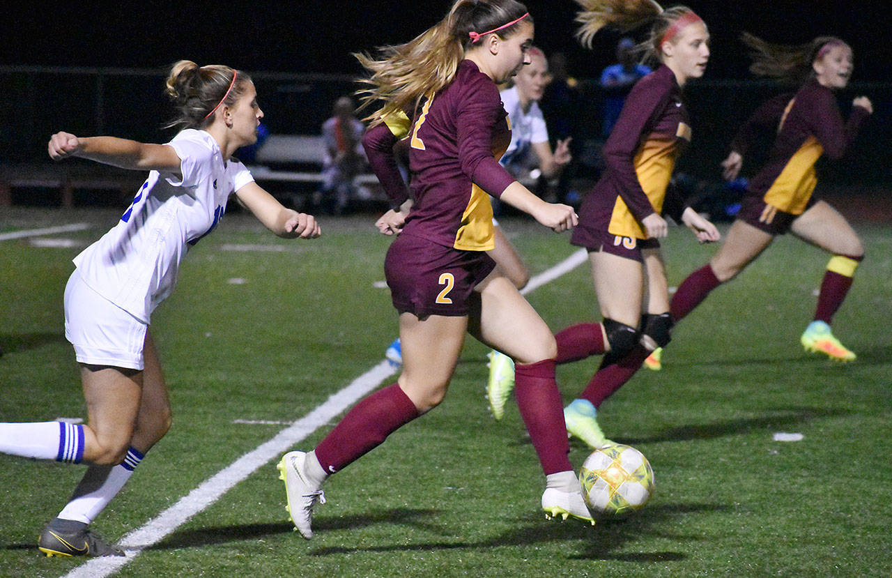 In this photo from earlier this season, White River’s Allie Koch races downfield. File photo by Kevin Hanson