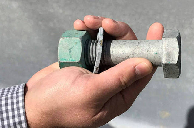 The state DOT notes there will be 5,320 of these bolts in place, holding together sections of the replacement Spiketon Creek Bridge. WSDOT PHOTO